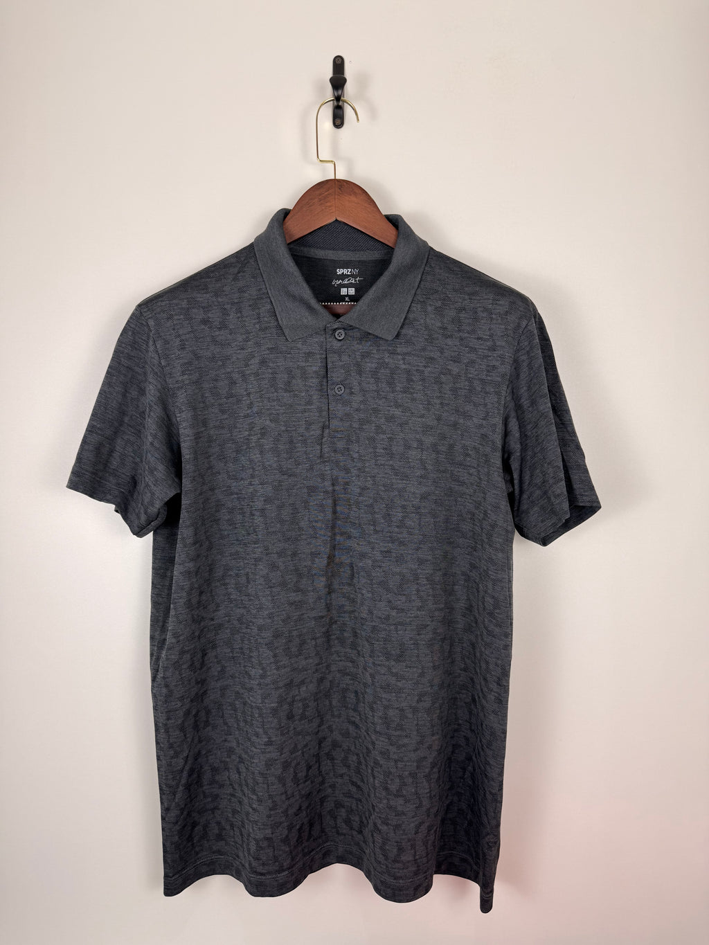 UniQlo Polo DriFit Leopard Print