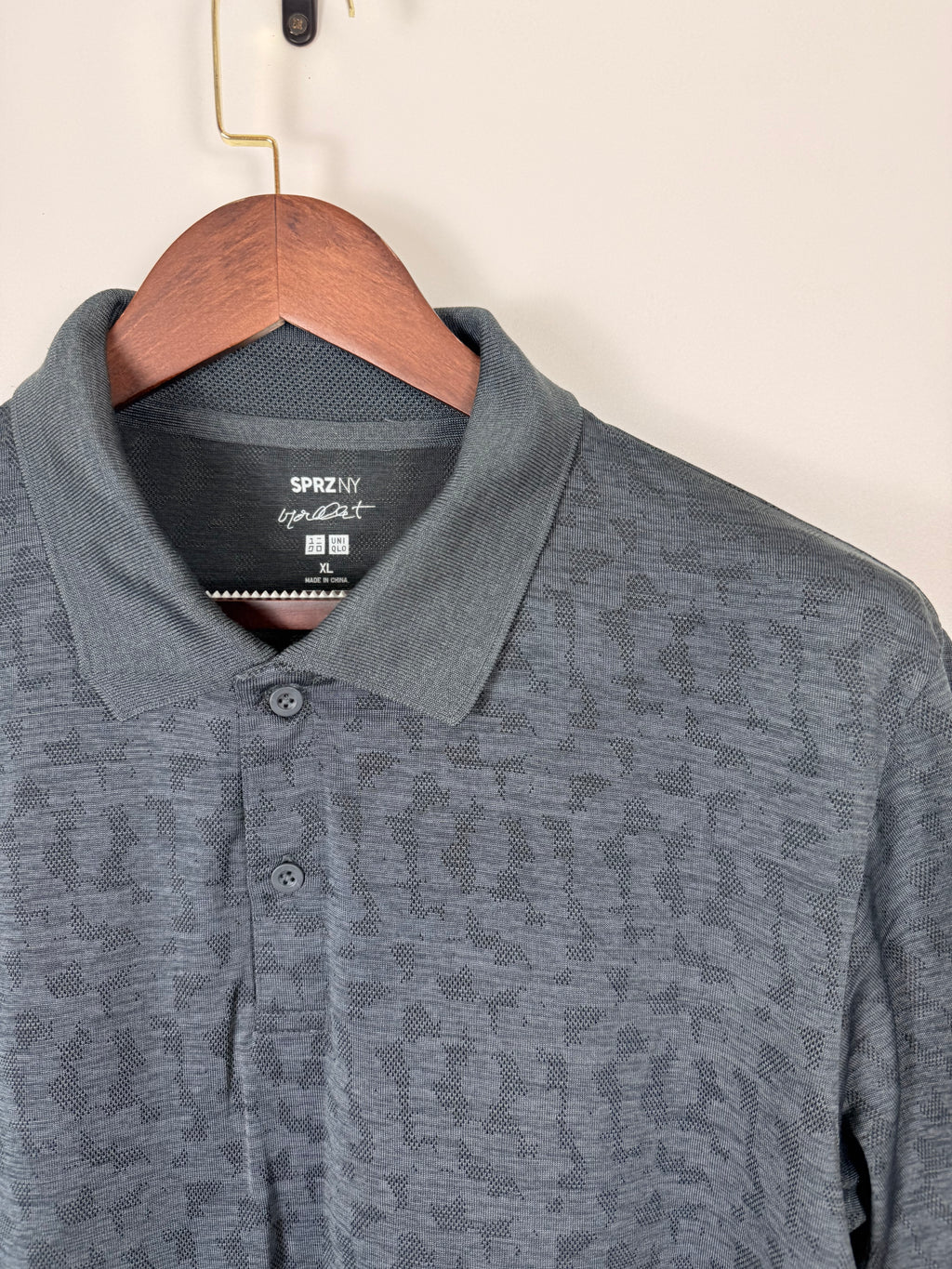 UniQlo Polo DriFit Leopard Print